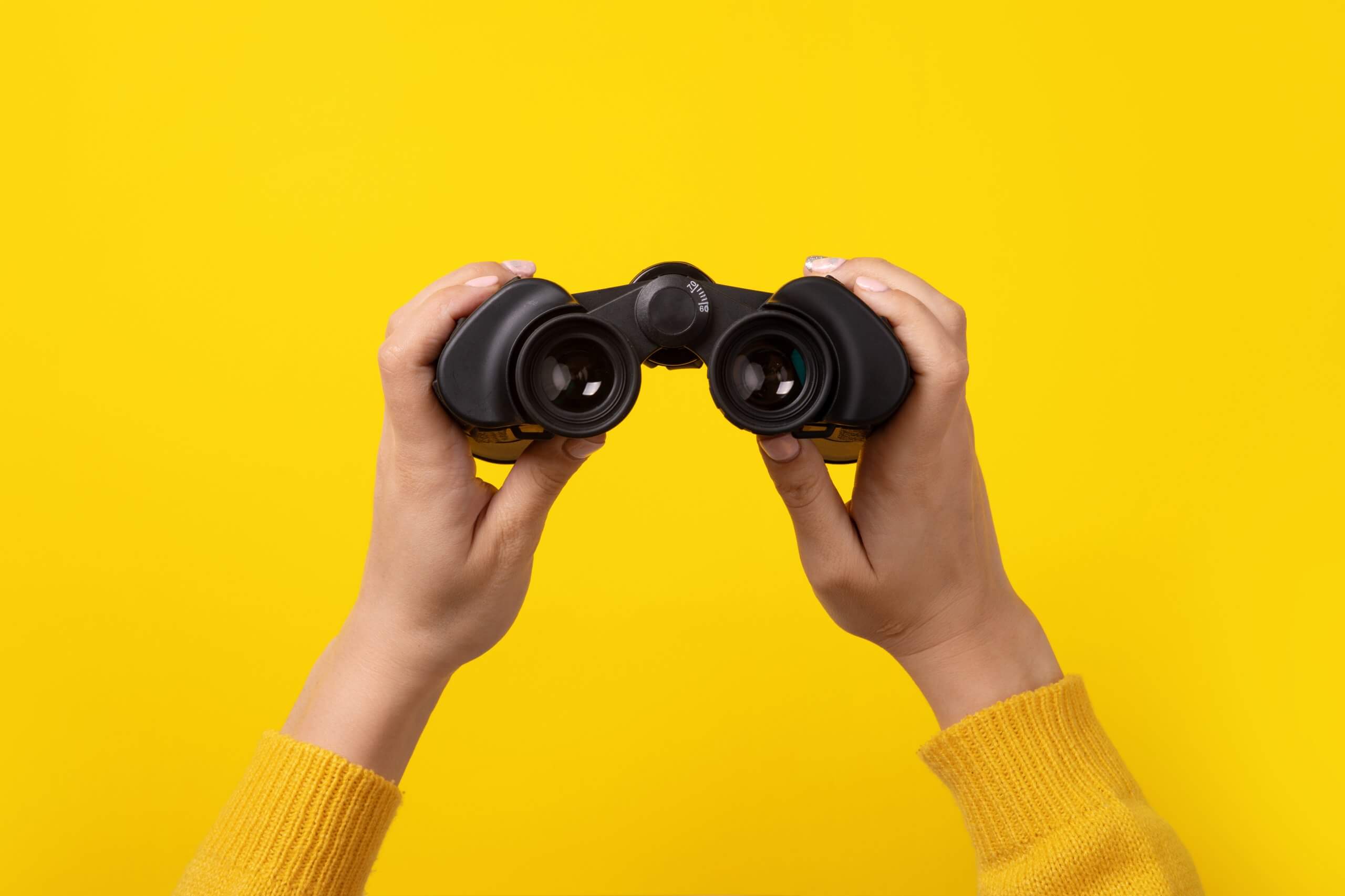 binoculars in hand